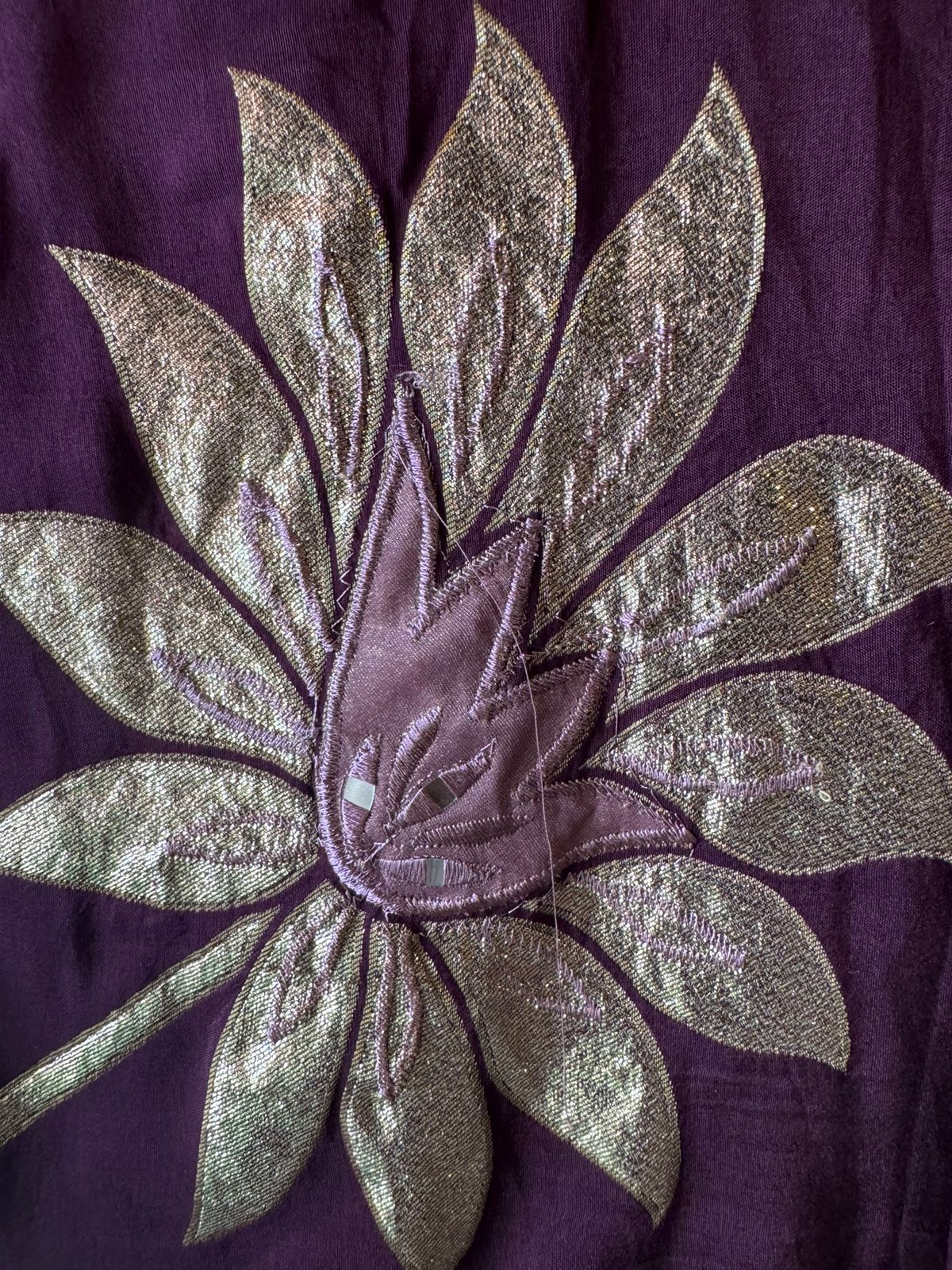 Pure Shimmer tissue Unstitched Shirt with Moti work on the neckline with thread and gotta patti detailings as well.