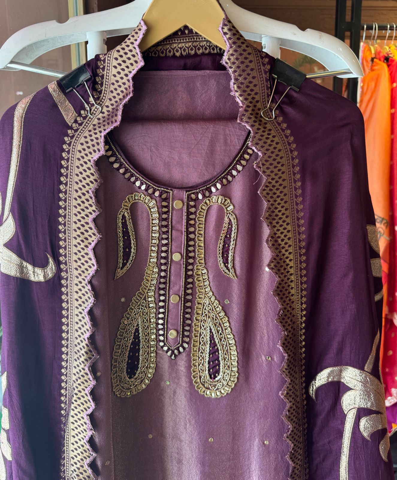 Pure Shimmer tissue Unstitched Shirt with Moti work on the neckline with thread and gotta patti detailings as well.