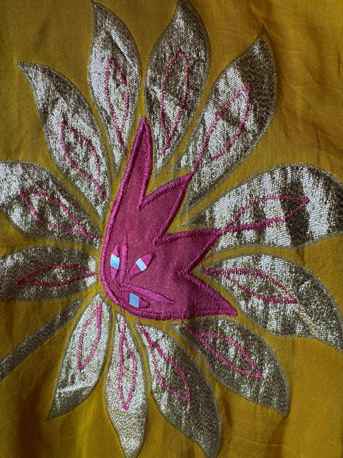 Pure Shimmer tissue Unstitched Shirt with Moti work on the neckline with thread and gotta patti detailings as well.