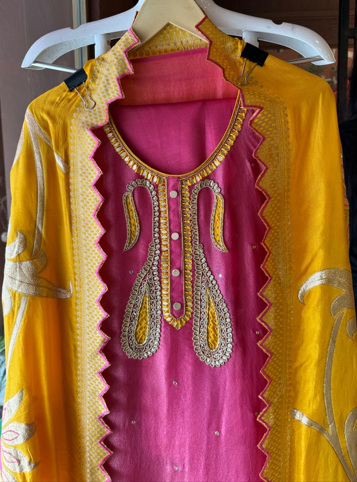 Pure Shimmer tissue Unstitched Shirt with Moti work on the neckline with thread and gotta patti detailings as well.