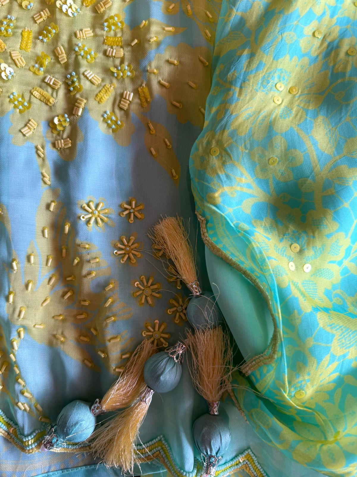 Premium Quality soft organza digital printed suits with handwork detailings on the shirt from and even on the neck Patti.