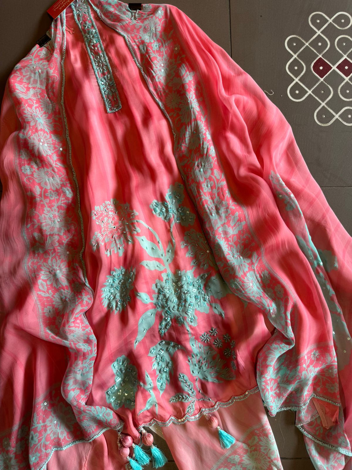 Premium Quality soft organza digital printed suits with handwork detailings on the shirt from and even on the neck Patti.