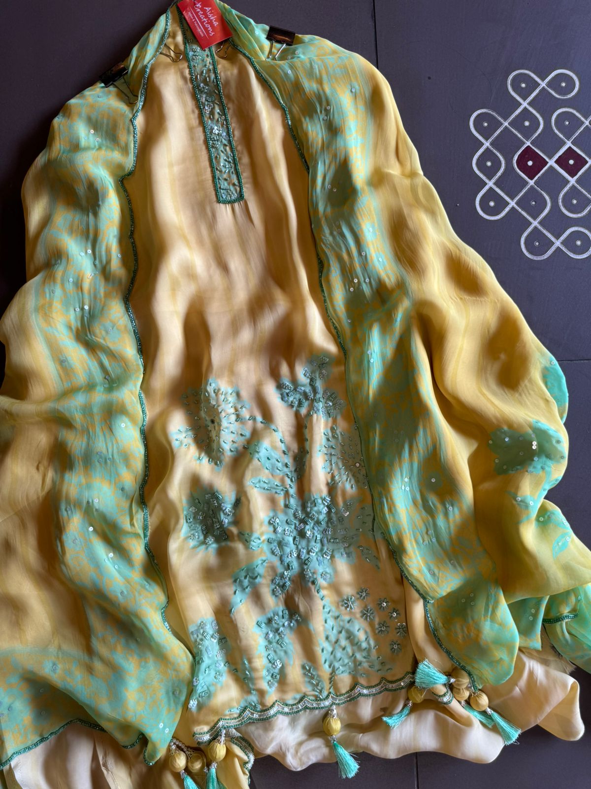 Premium Quality soft organza digital printed suits with handwork detailings on the shirt from and even on the neck Patti.