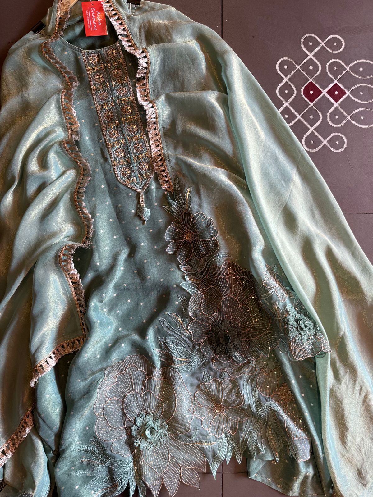 Soft shimmer tissue Unstitched Full size shirt with zari booties overall with a Neck Patti and latkan attached