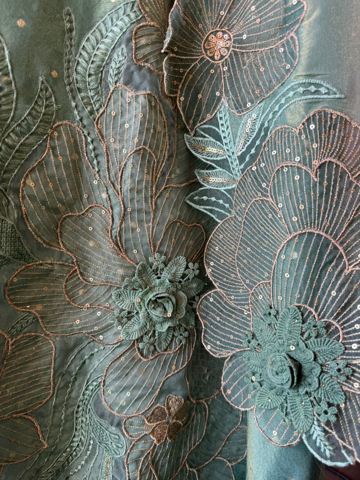 Soft shimmer tissue Unstitched Full size shirt with zari booties overall with a Neck Patti and latkan attached