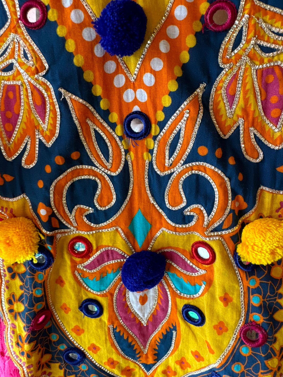 Beautiful Hakuba chicken tunic Looser fit with Gorgeous Mughal paisley print patch on the neckline with Pom Pom’s attached