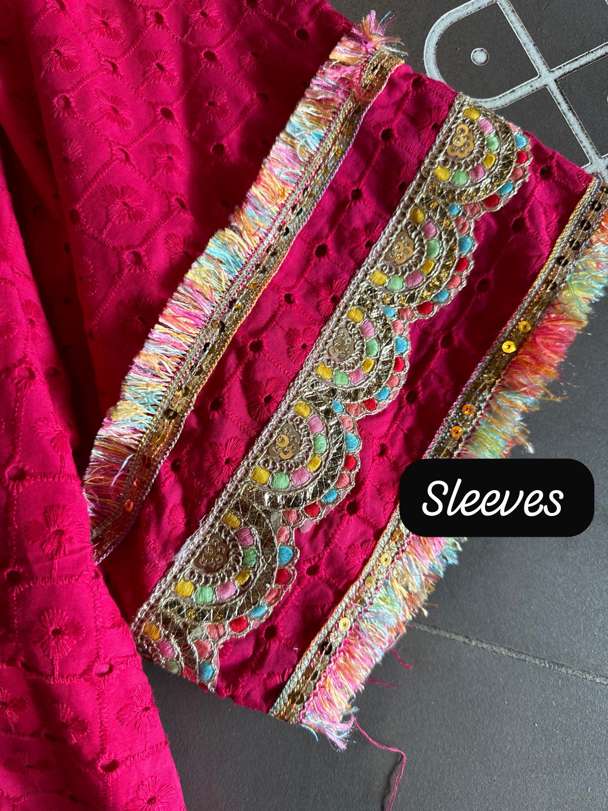 Beautiful Hakuba chicken tunic Looser fit with Gorgeous Mughal paisley print patch on the neckline with Pom Pom’s attached