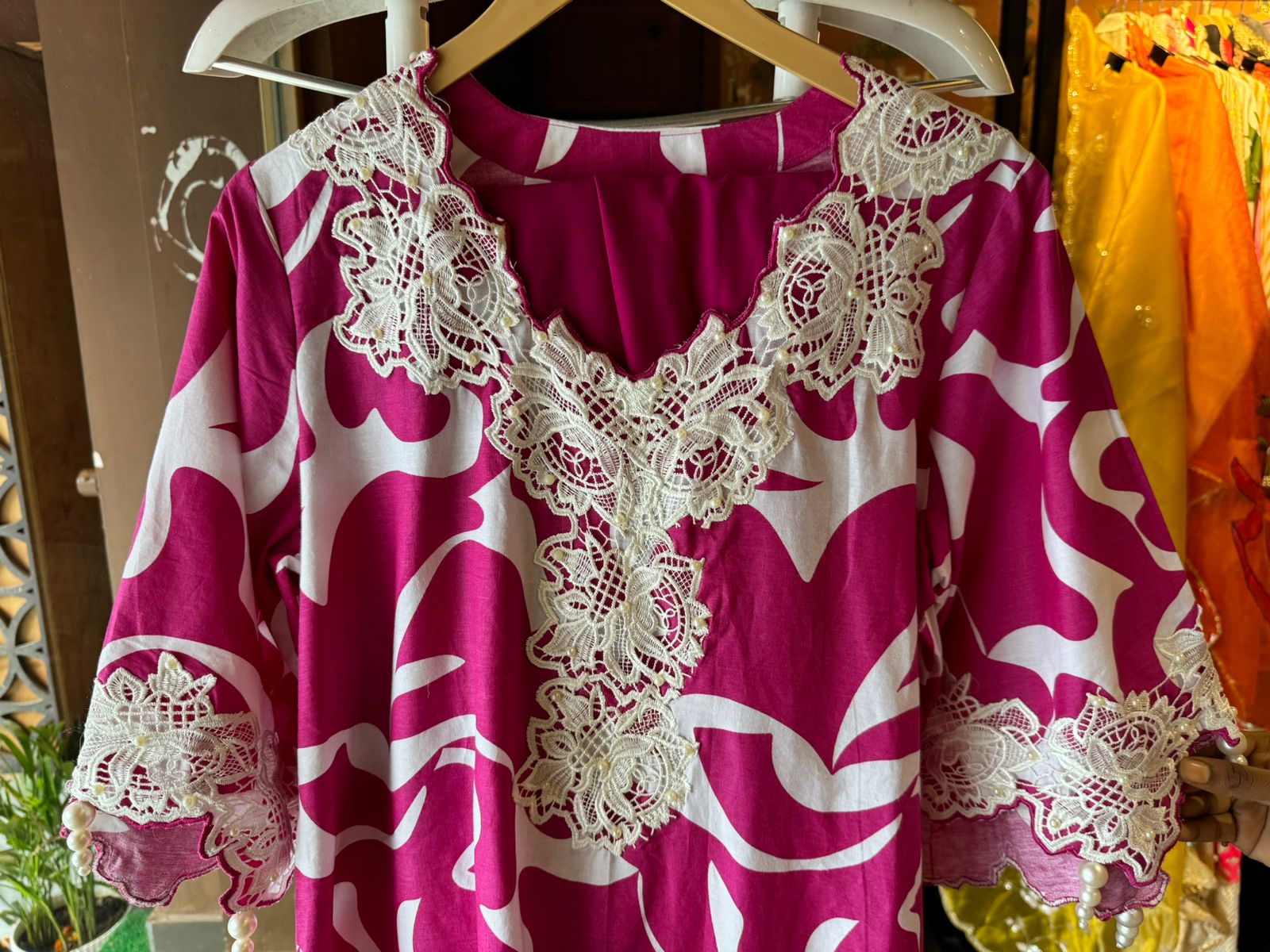 Pure cotton printed Kurta , Looser and A Pattern with beautiful Cutwork cotton crochia lacework done on the neckline, Sleeves and ghera of the shirt with pearl latkans attached.