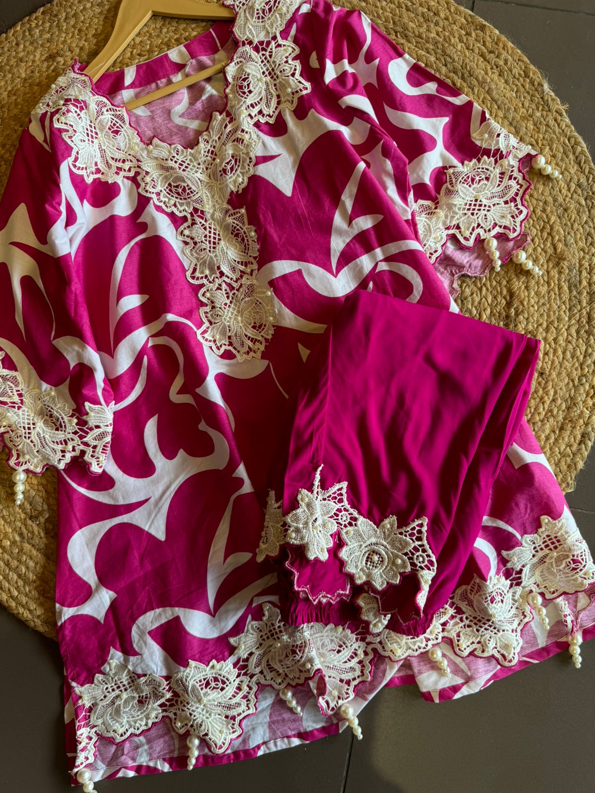 Pure cotton printed Kurta , Looser and A Pattern with beautiful Cutwork cotton crochia lacework done on the neckline, Sleeves and ghera of the shirt with pearl latkans attached.