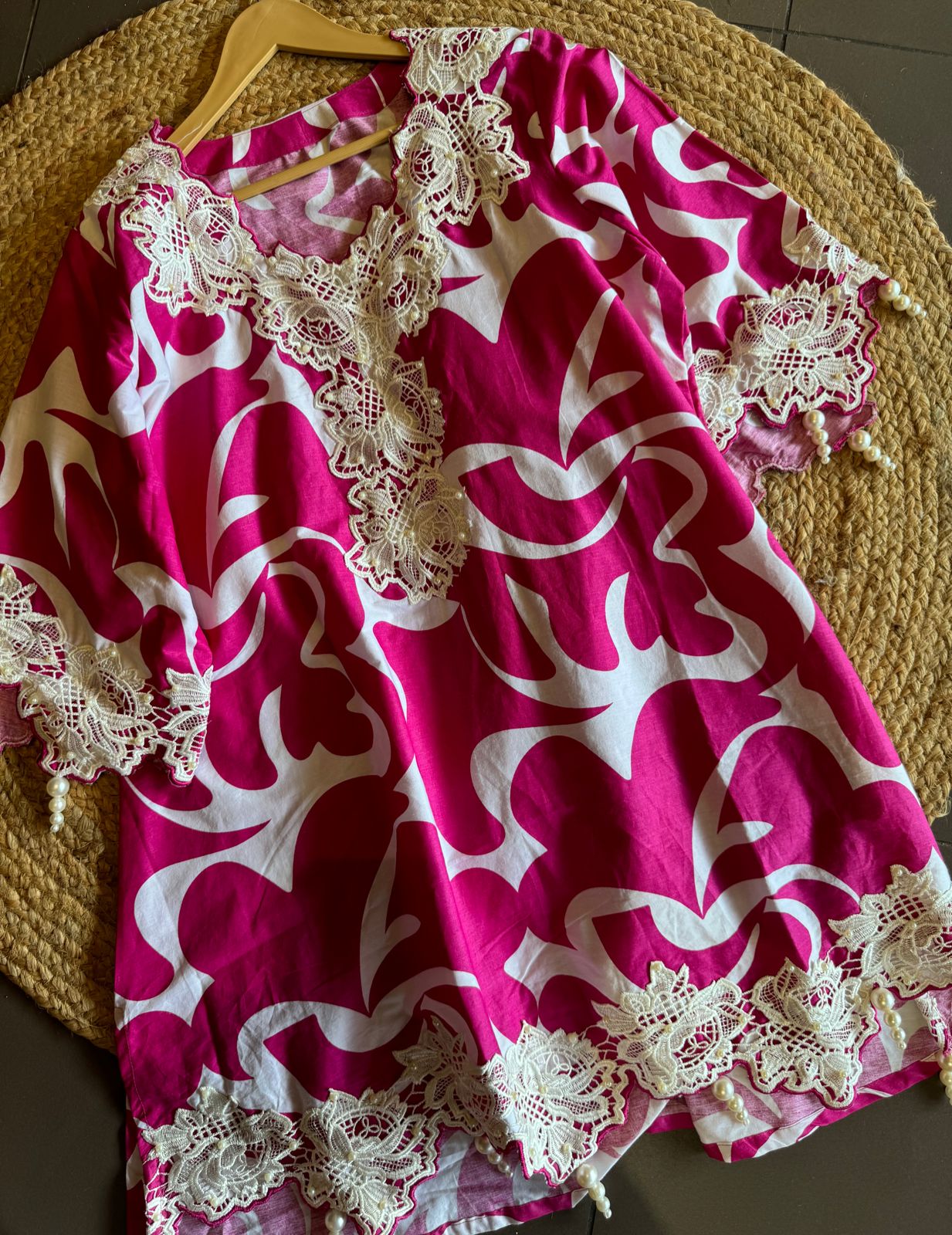 Pure cotton printed Kurta , Looser and A Pattern with beautiful Cutwork cotton crochia lacework done on the neckline, Sleeves and ghera of the shirt with pearl latkans attached.