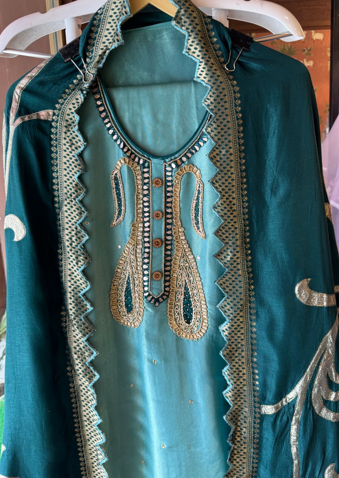 Pure Shimmer tissue Unstitched Shirt with Moti work on the neckline with thread and gotta patti detailings as well.