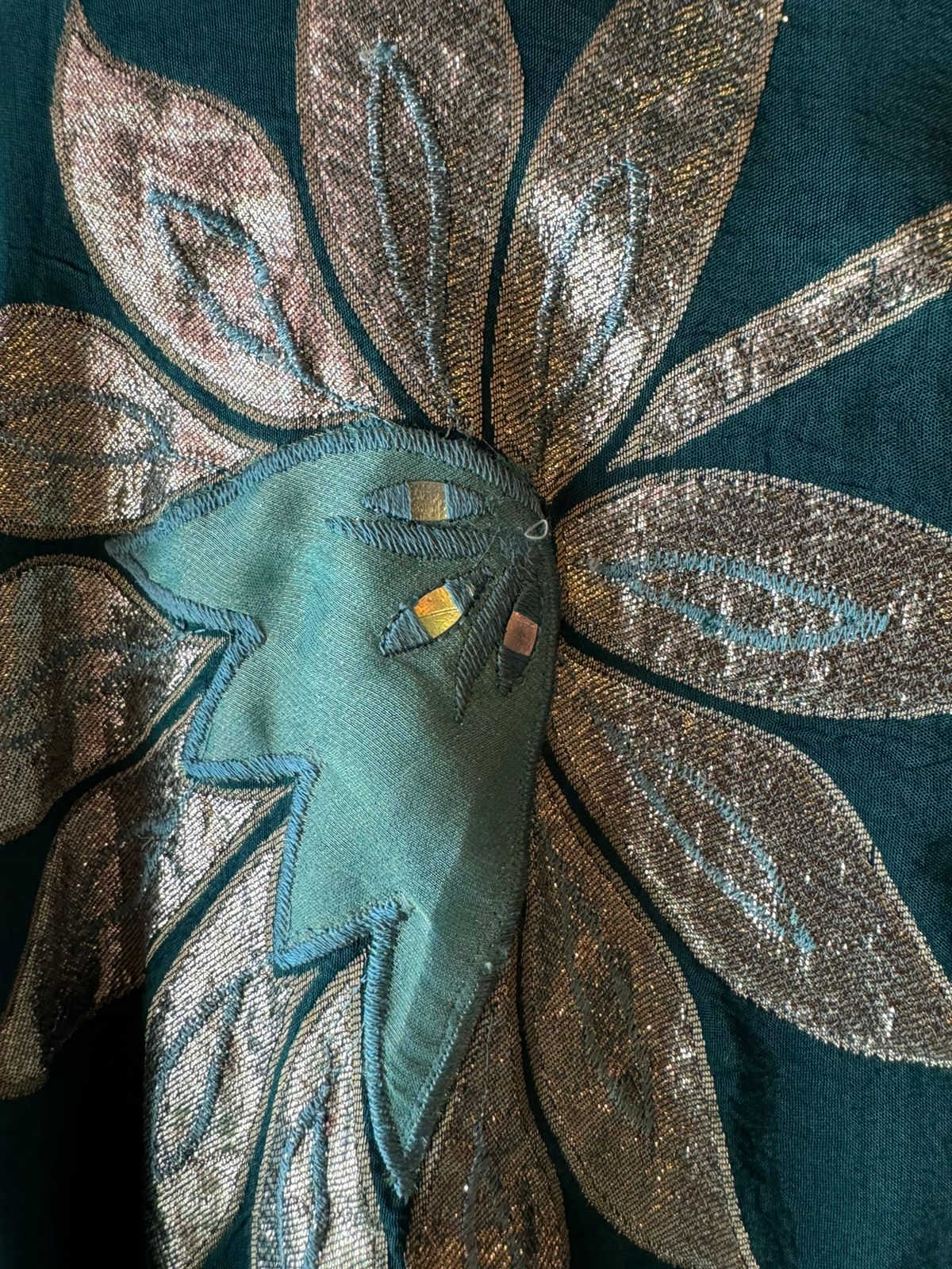 Pure Shimmer tissue Unstitched Shirt with Moti work on the neckline with thread and gotta patti detailings as well.