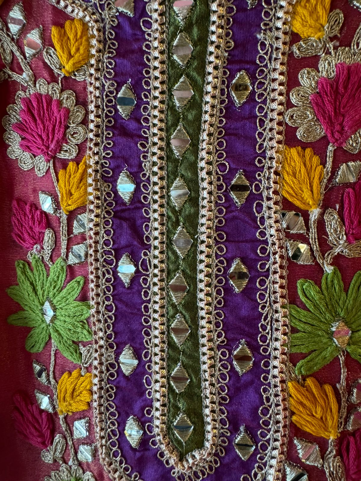 Beautiful shimmer tissue Unstitched Full size shirt with multi Coloured thread embroidery done with the neckline and ghera with Moti lace attached on the ghera.