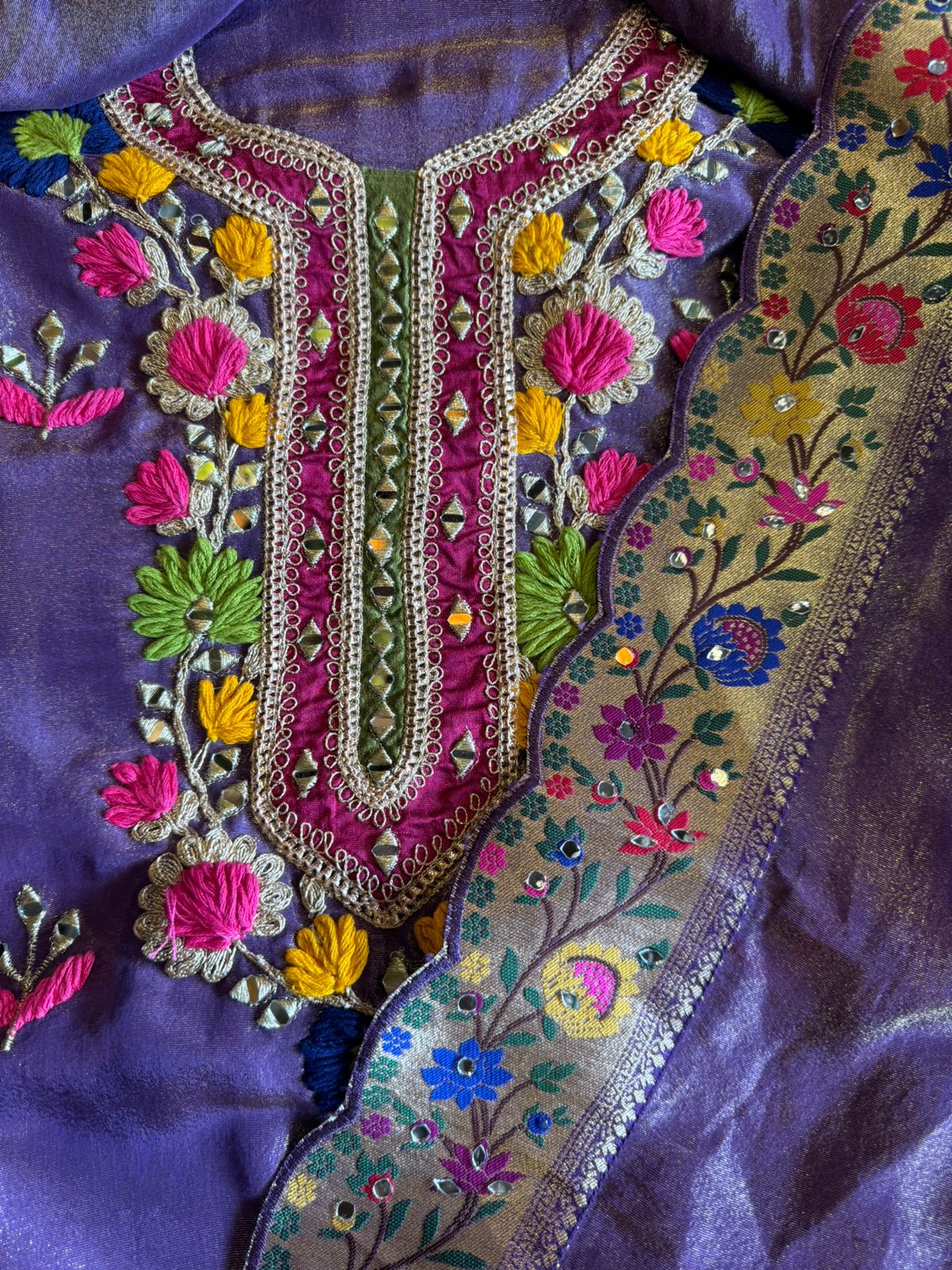 Beautiful shimmer tissue Unstitched Full size shirt with multi Coloured thread embroidery done with the neckline and ghera with Moti lace attached on the ghera.