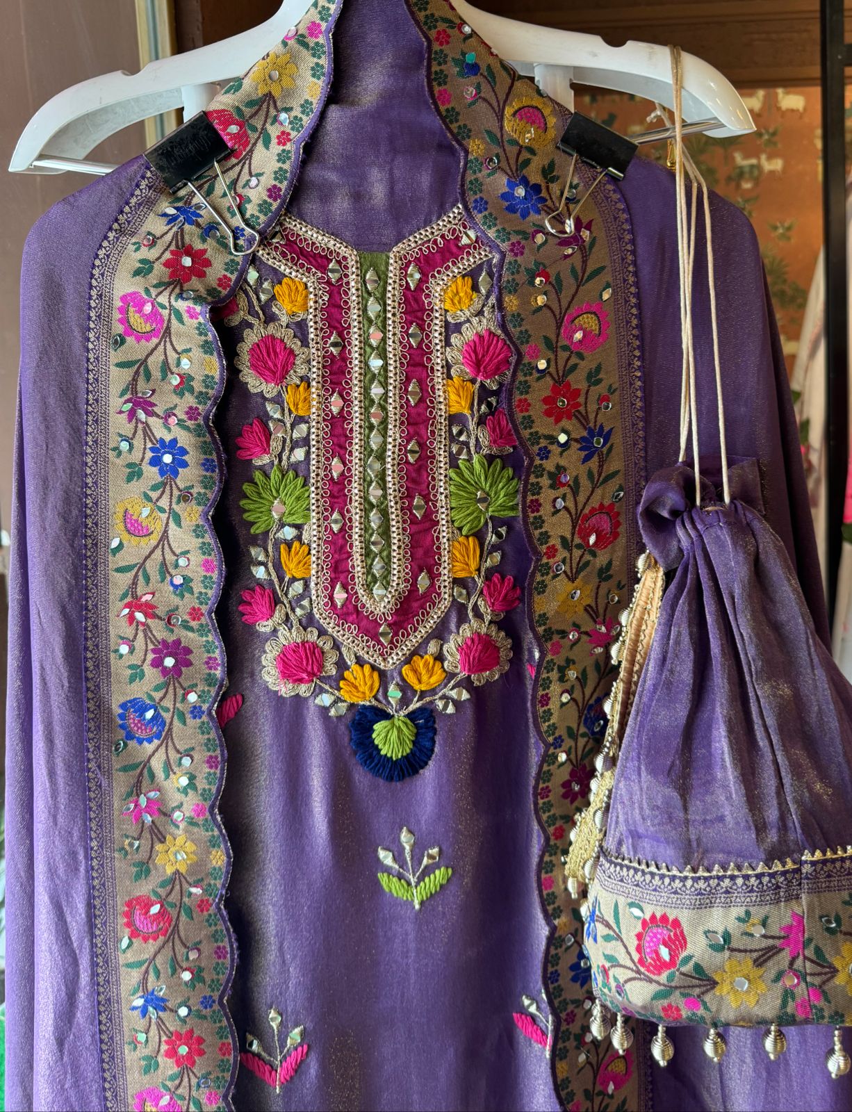 Beautiful shimmer tissue Unstitched Full size shirt with multi Coloured thread embroidery done with the neckline and ghera with Moti lace attached on the ghera.