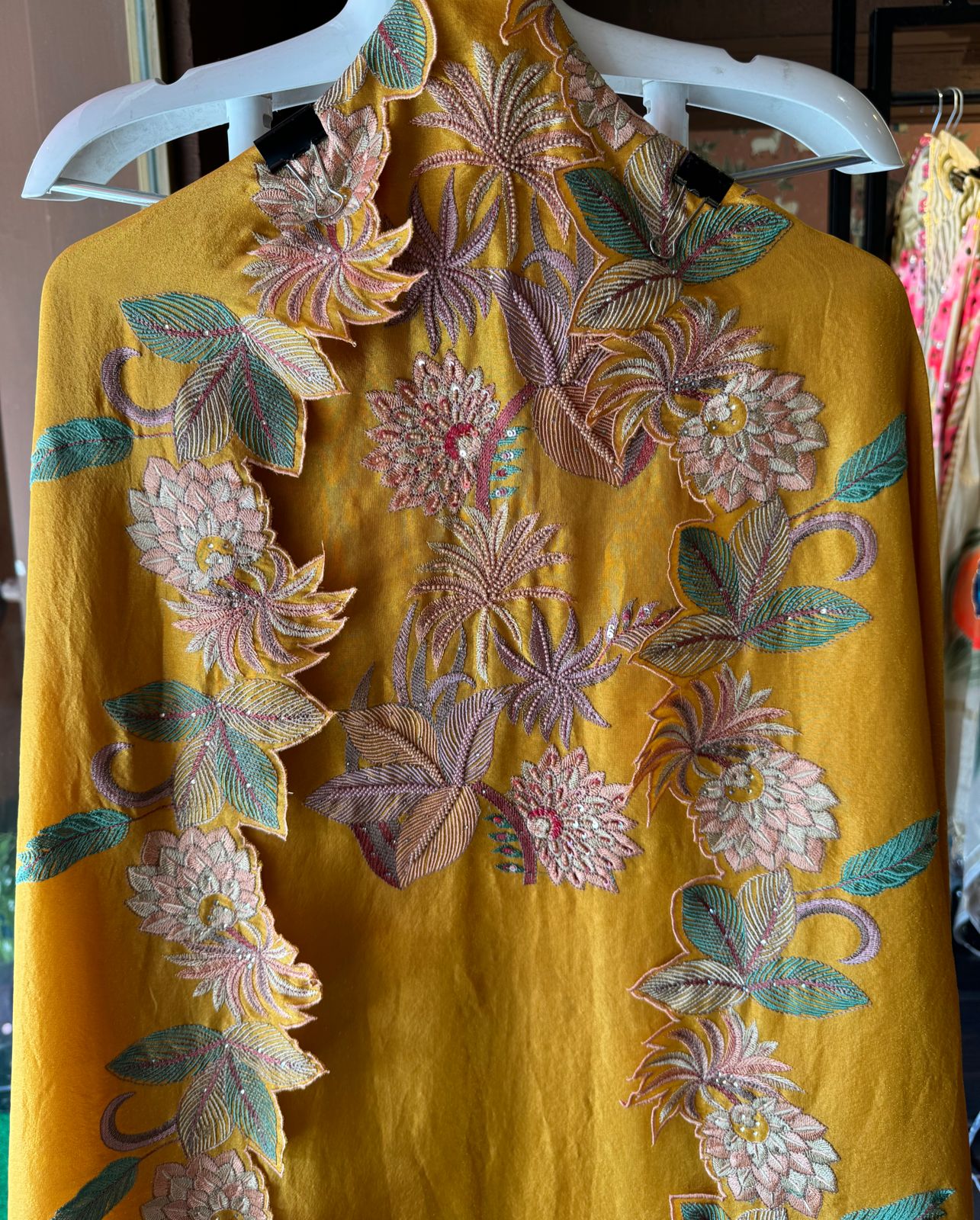 Shimmer tissue unstitched full size shirt with very smart Neckwork done with thread and Moti work done on the neckline (Very beautifully done)