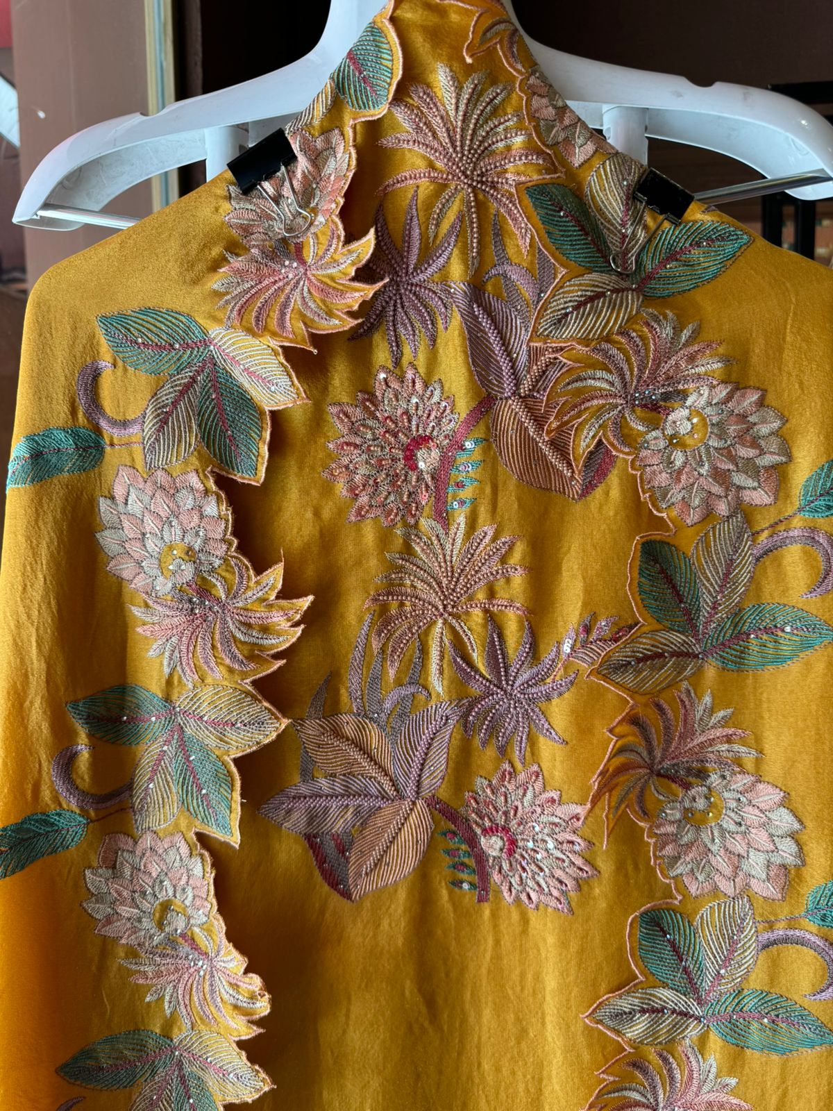 Shimmer tissue unstitched full size shirt with very smart Neckwork done with thread and Moti work done on the neckline (Very beautifully done)