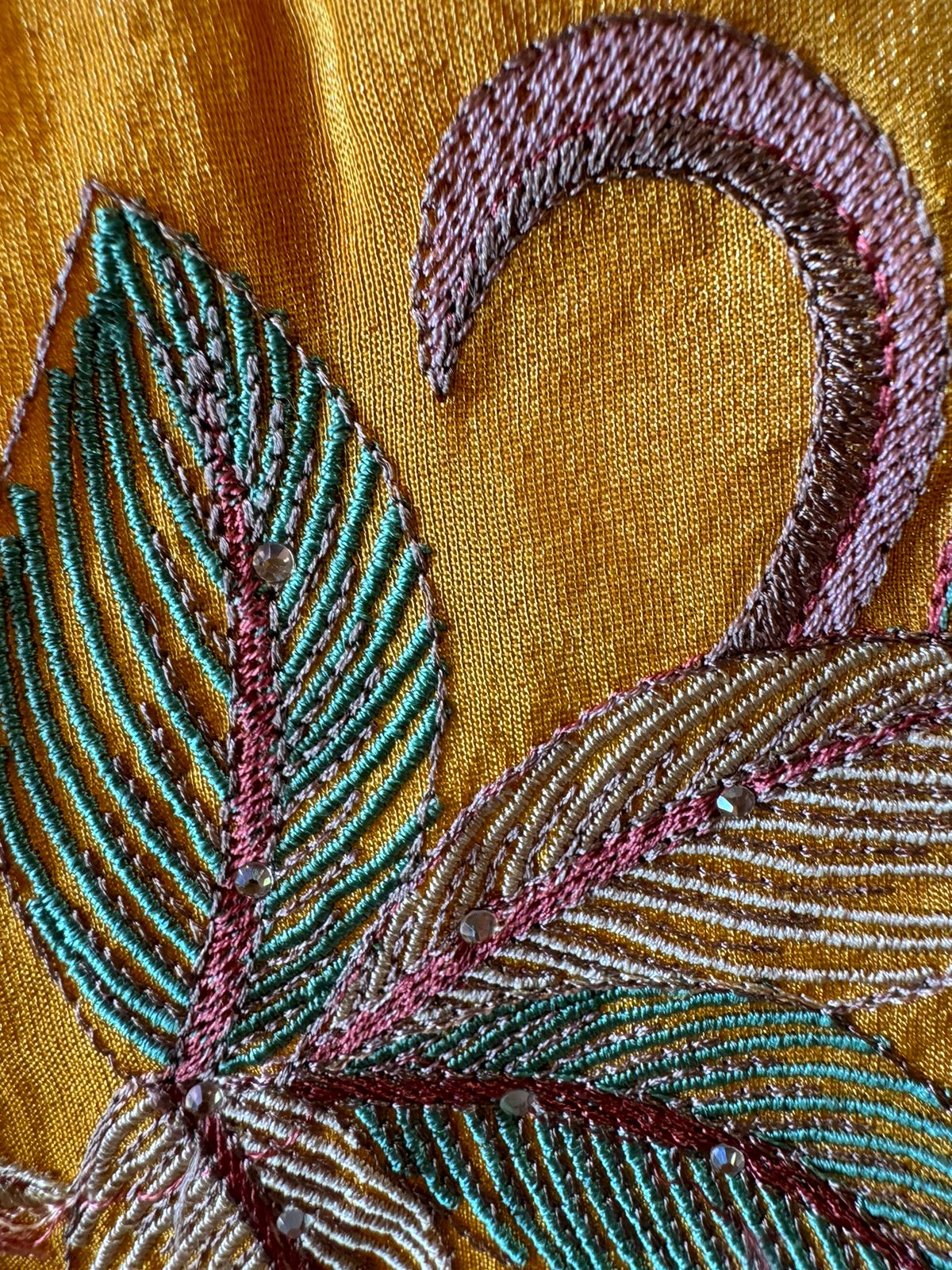 Shimmer tissue unstitched full size shirt with very smart Neckwork done with thread and Moti work done on the neckline (Very beautifully done)