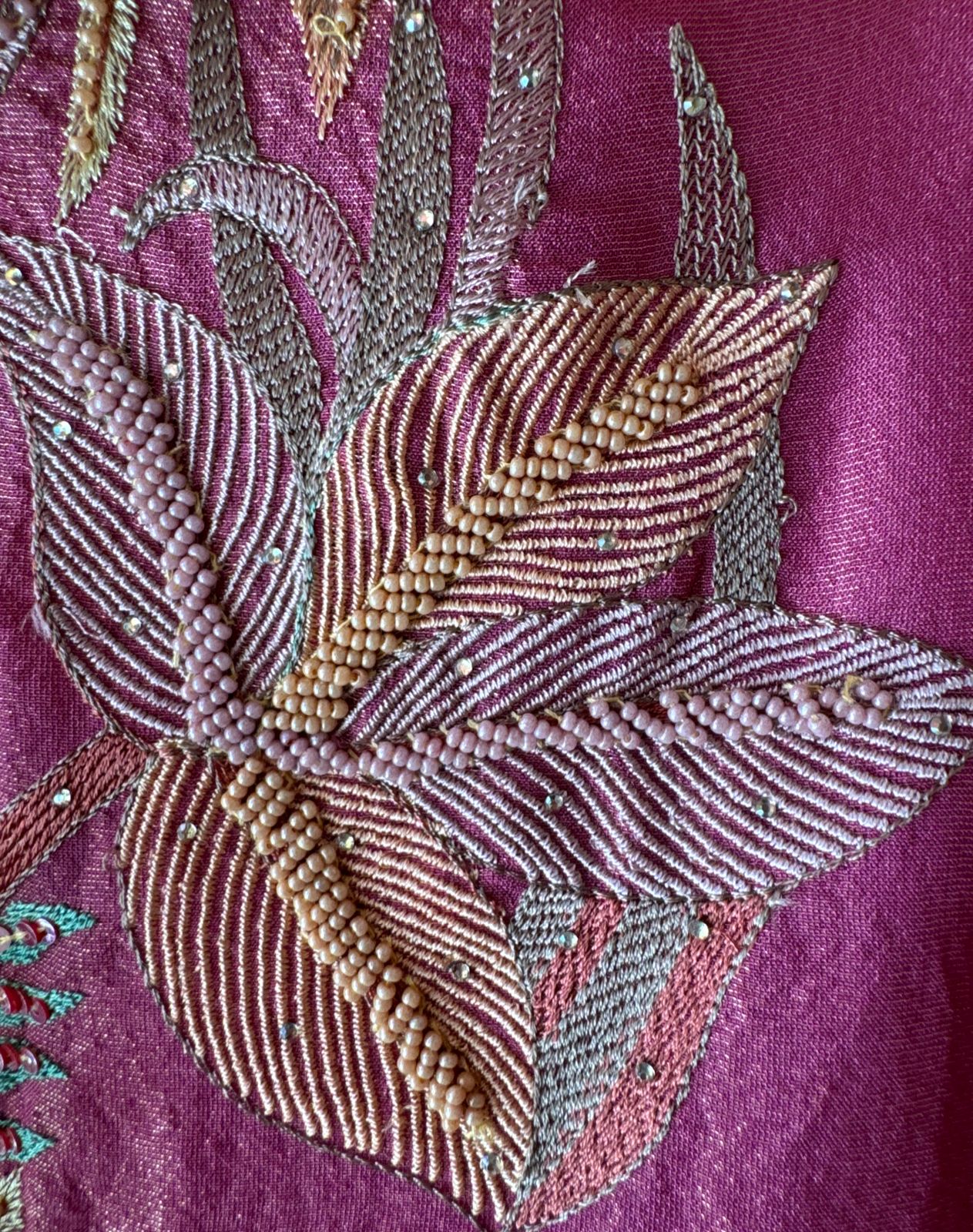 Shimmer tissue unstitched full size shirt with very smart Neckwork done with thread and Moti work done on the neckline (Very beautifully done)