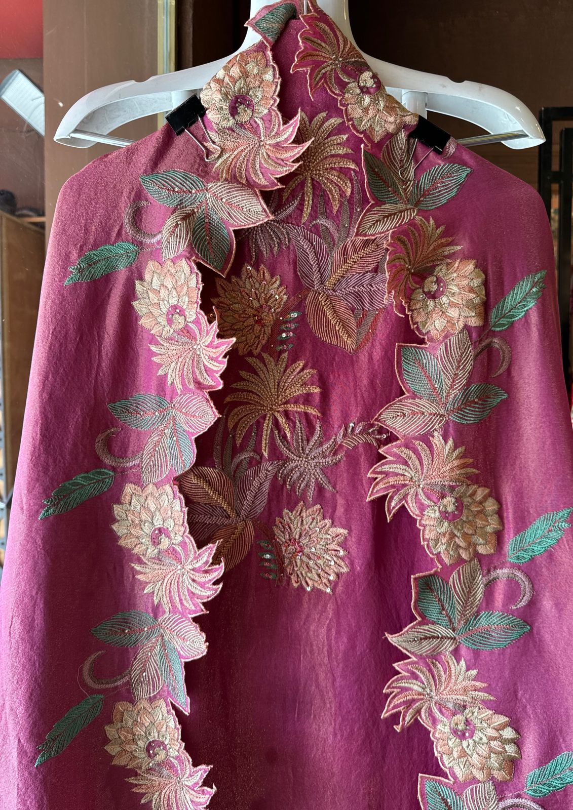 Shimmer tissue unstitched full size shirt with very smart Neckwork done with thread and Moti work done on the neckline (Very beautifully done)