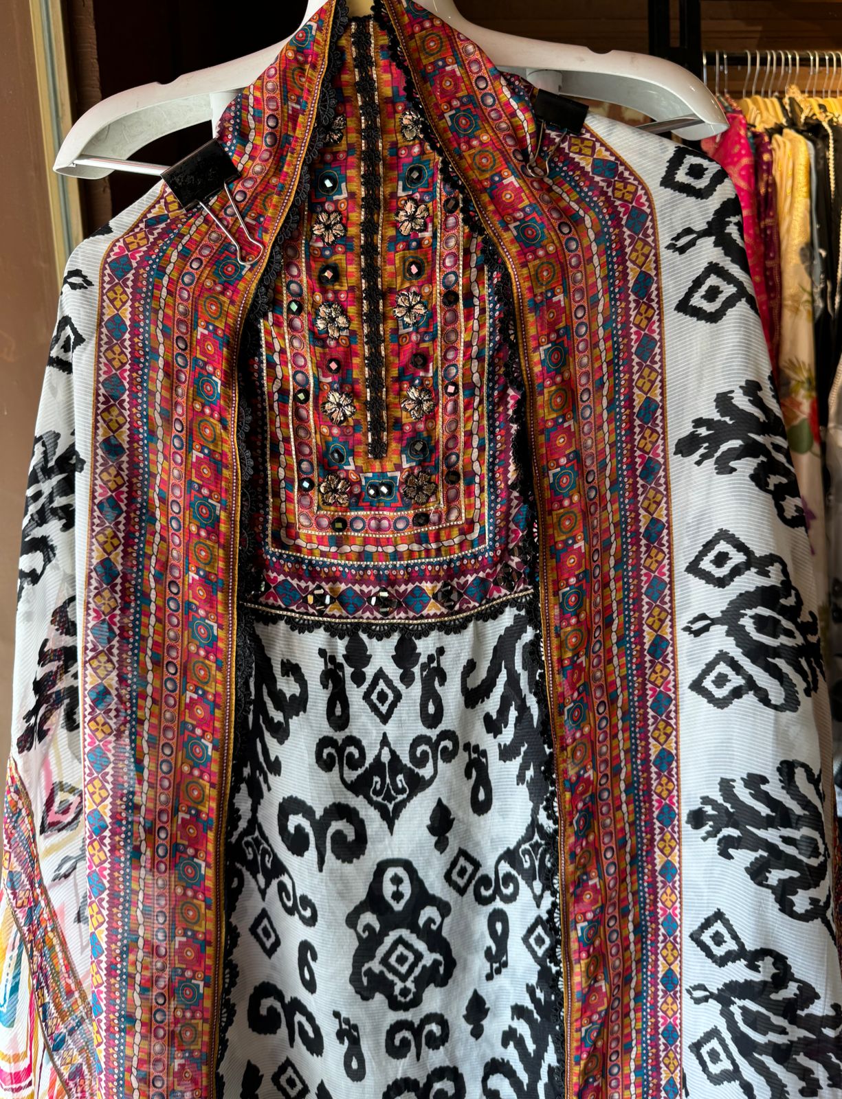 Self organza unstitched shirt kurta with ikkat digital printing done on the full shirt front and back as well.