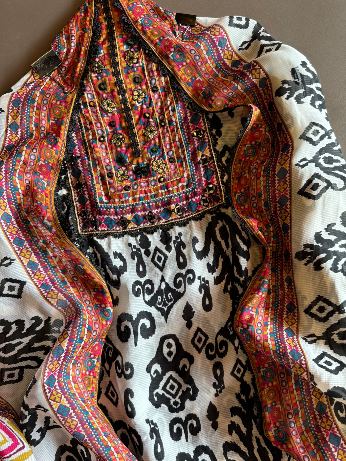 Self organza unstitched shirt kurta with ikkat digital printing done on the full shirt front and back as well.