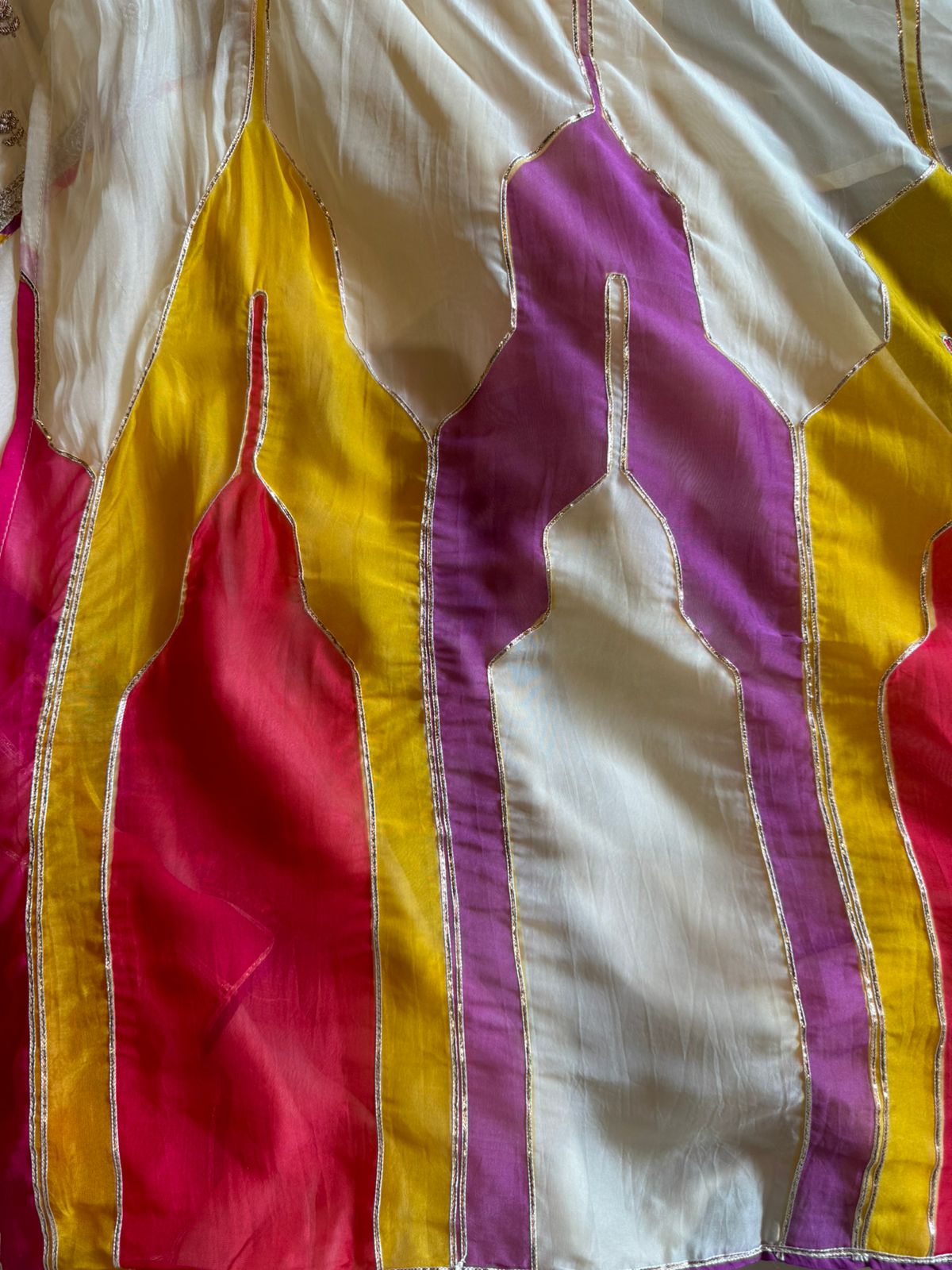 Soft organza Unstitched Shirt with angrakha design neckline with Dori and Dabka work booties with piping done.