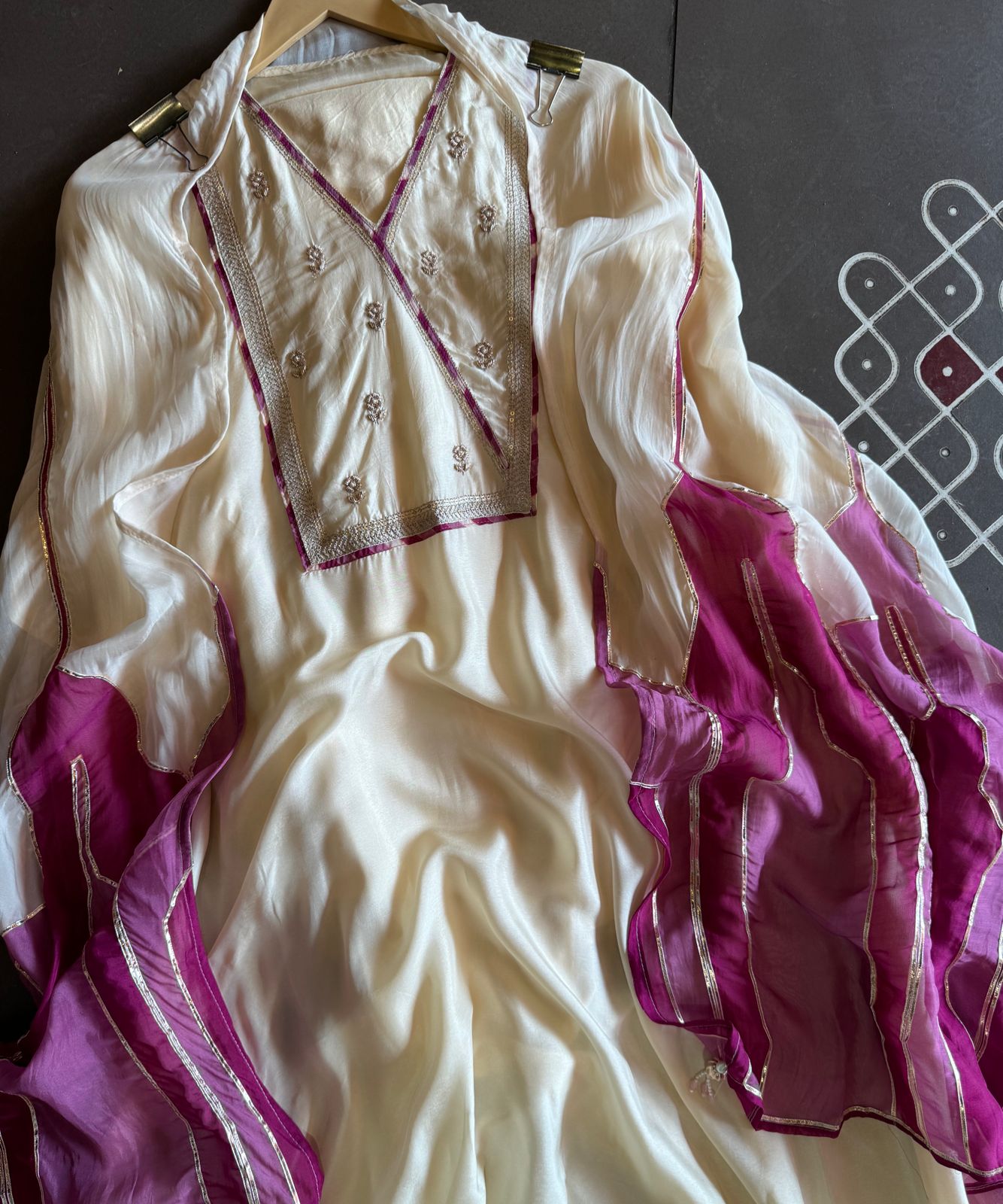 Soft organza Unstitched Shirt with angrakha design neckline with Dori and Dabka work booties with piping done.