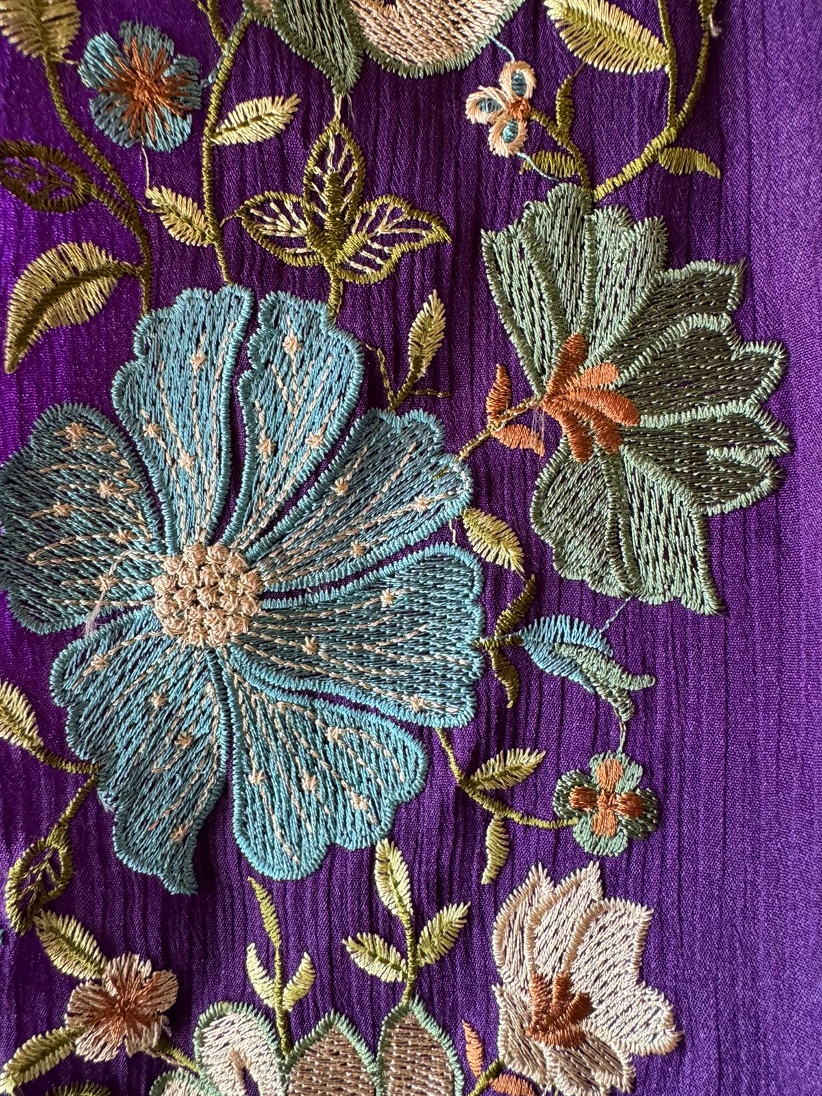 Opada silk Unstitched suit fabrics with very gorgeous floral threadwork on the ghera with soft Cutwork and scalloping