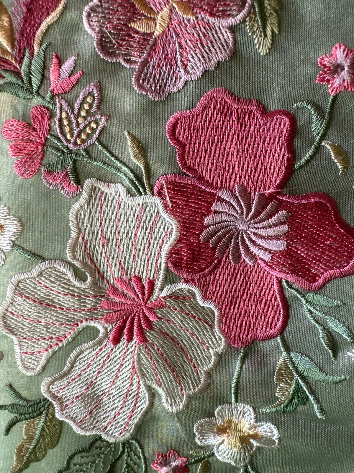 Organza Unstitched suit fabrics with very gorgeous floral threadwork on the ghera with soft Cutwork and scalloping