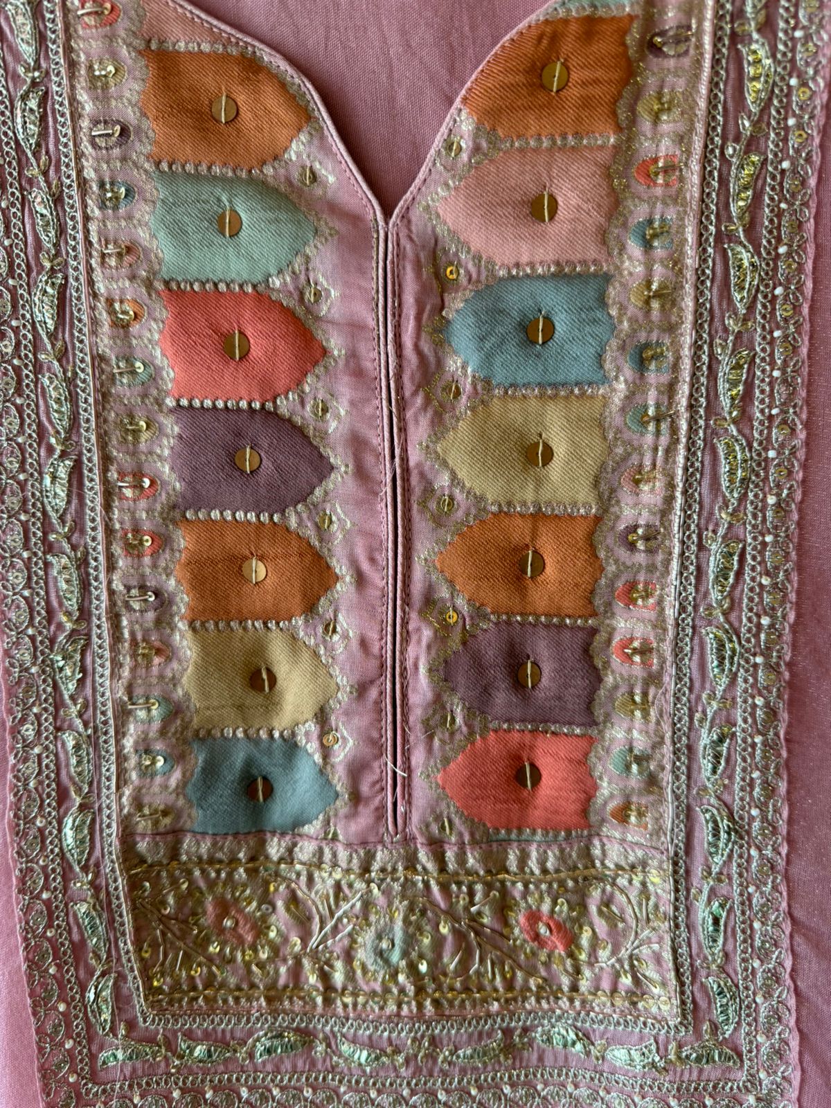 Shimmer tissue Unstitched Shirt with Sabyasachi inspired Neckline and Saaman Colourful cushioned pattern with sequence and Dori work detailings.