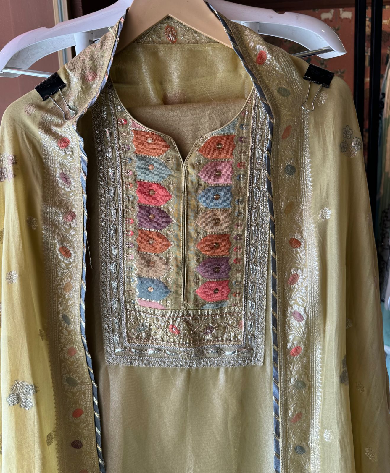 Shimmer tissue Unstitched Shirt with Sabyasachi inspired Neckline and Saaman Colourful cushioned pattern with sequence and Dori work detailings.