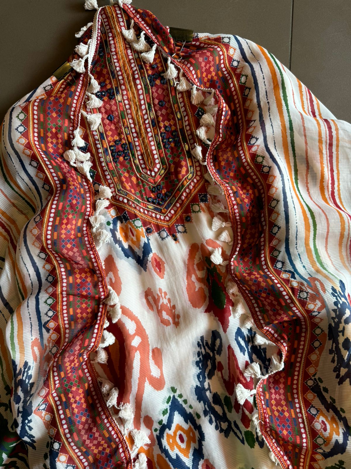 Self organza unstitched shirt kurta with ikkat digital printing done on the full shirt front and back as well.