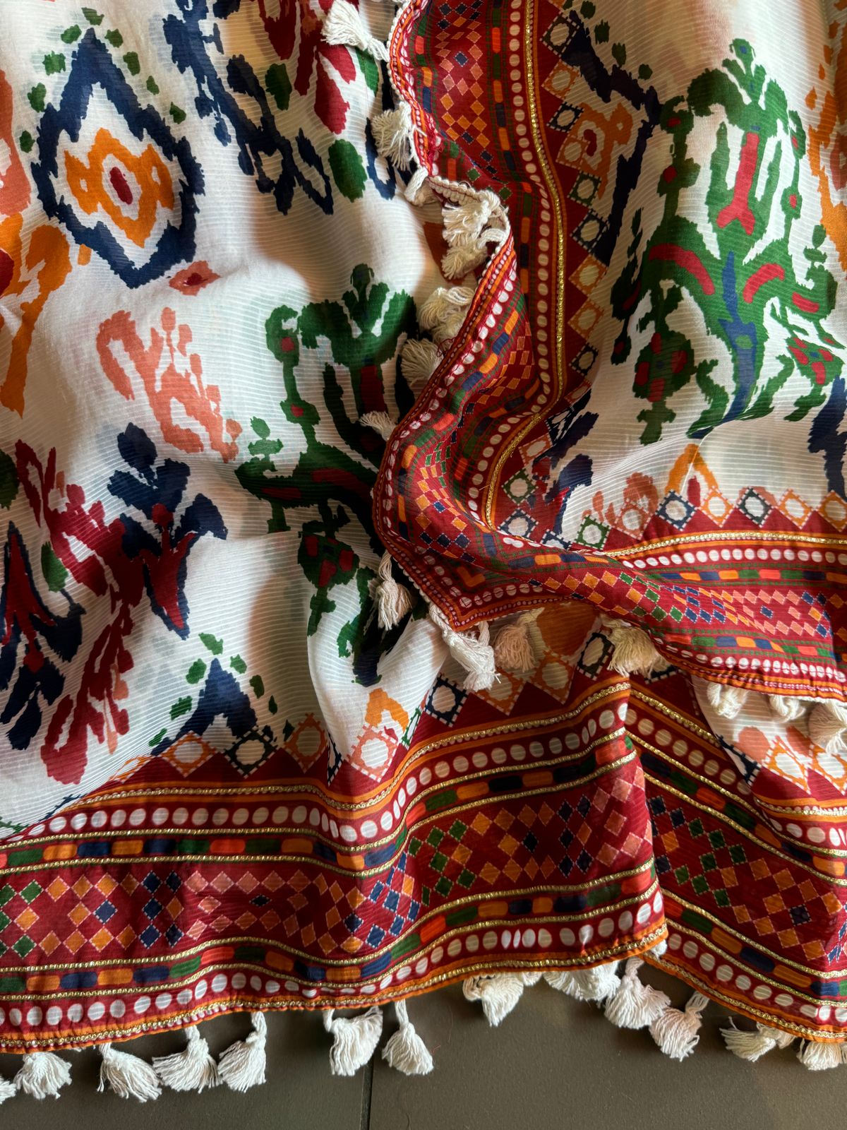 Self organza unstitched shirt kurta with ikkat digital printing done on the full shirt front and back as well.