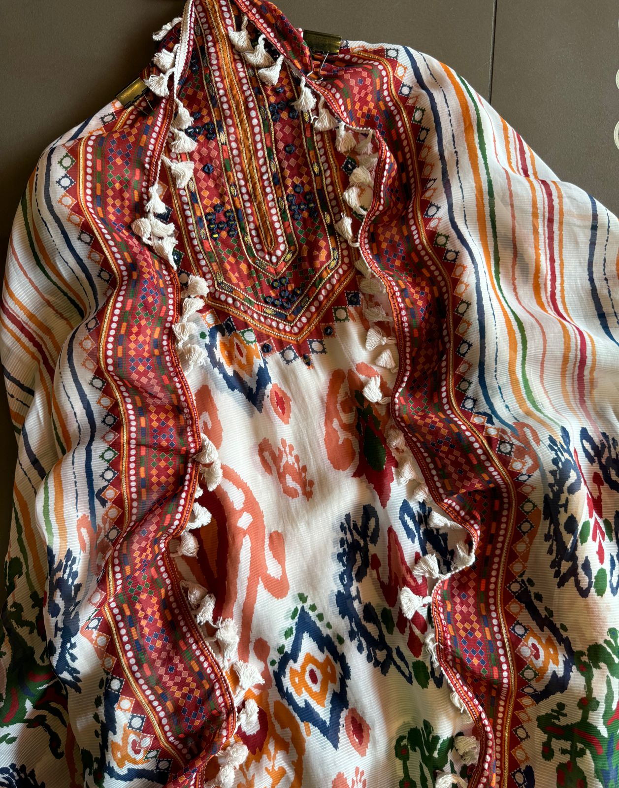 Self organza unstitched shirt kurta with ikkat digital printing done on the full shirt front and back as well.