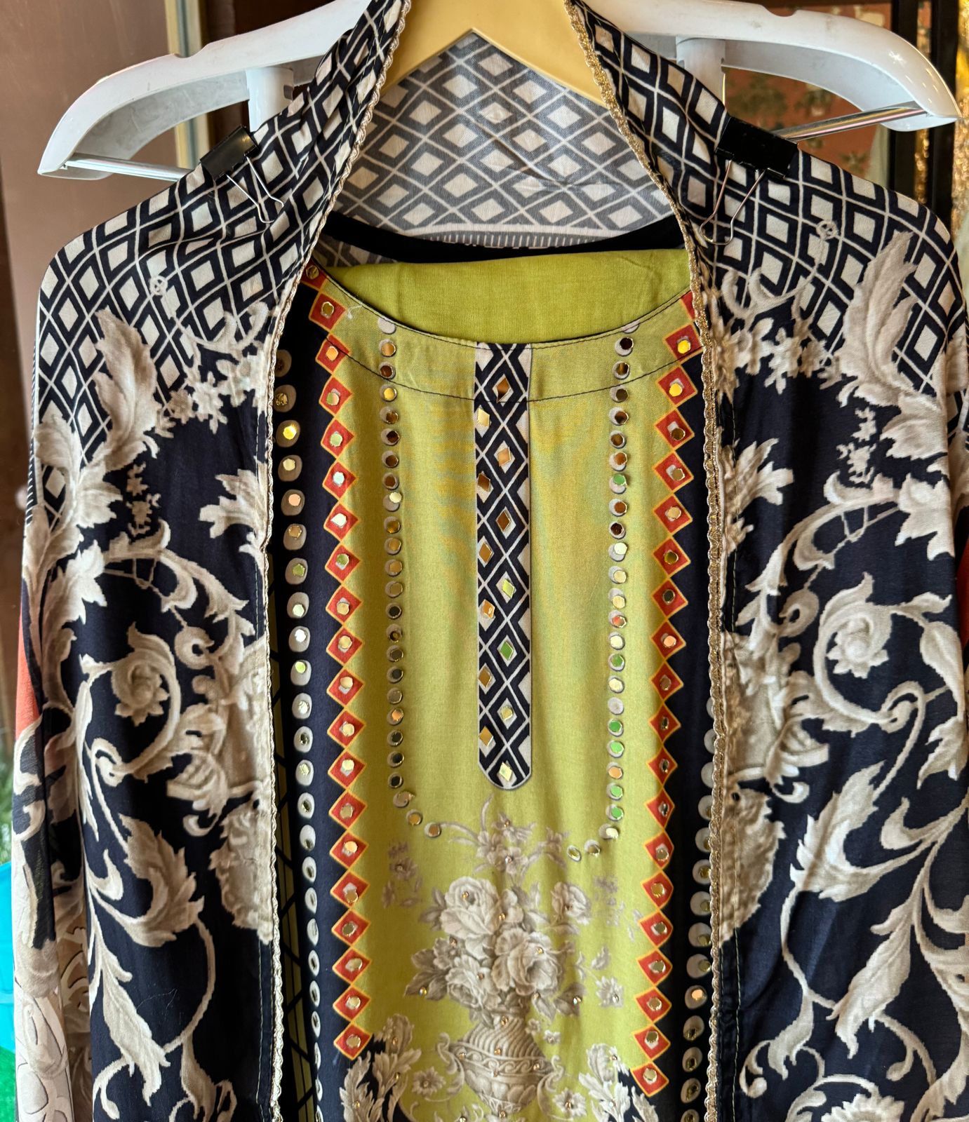 Muslin Silk digital printed Pakistani semi stitched Suit with original mirror work highlighting on the shirt front