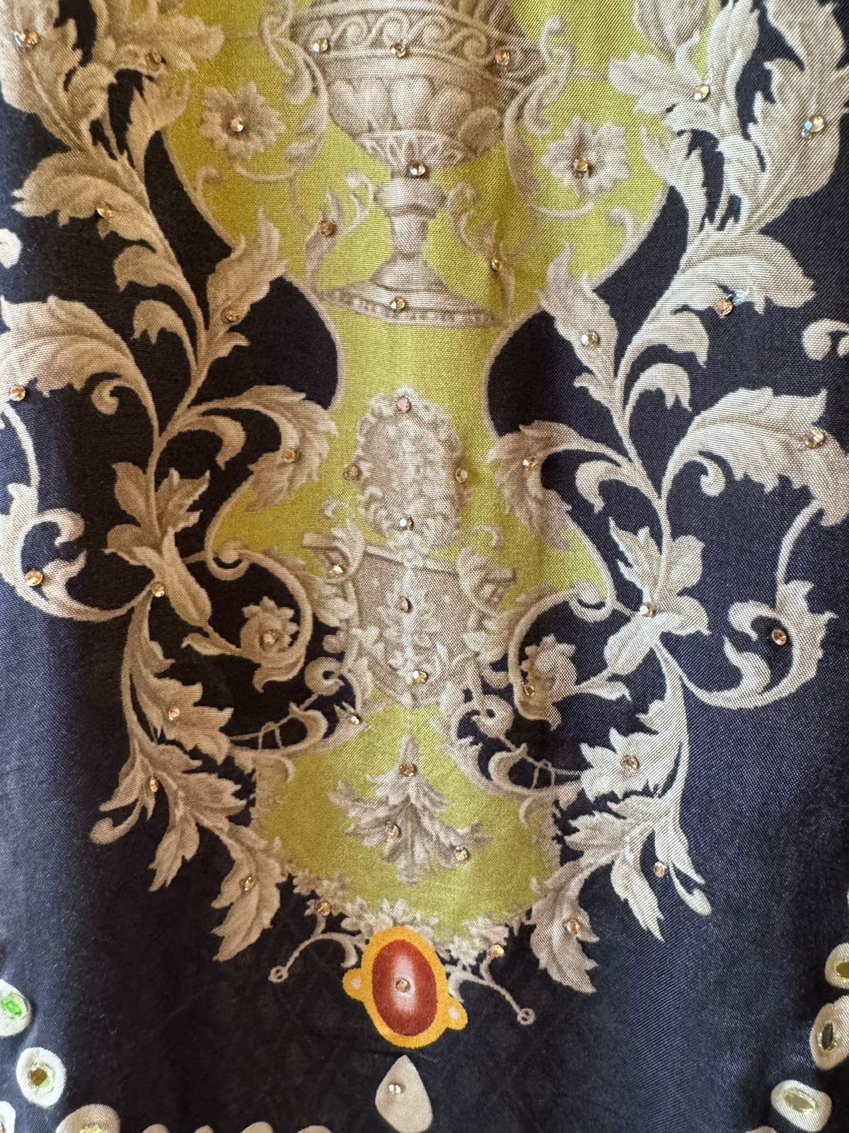 Muslin Silk digital printed Pakistani semi stitched Suit with original mirror work highlighting on the shirt front