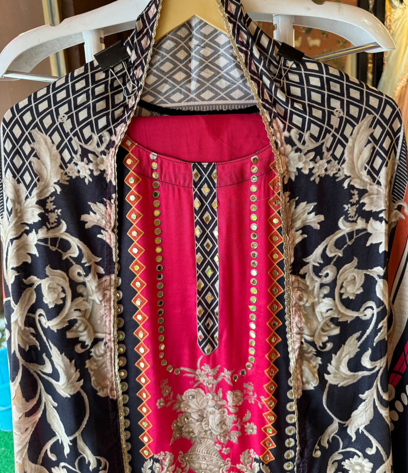 Muslin Silk digital printed Pakistani semi stitched Suit with original mirror work highlighting on the shirt front