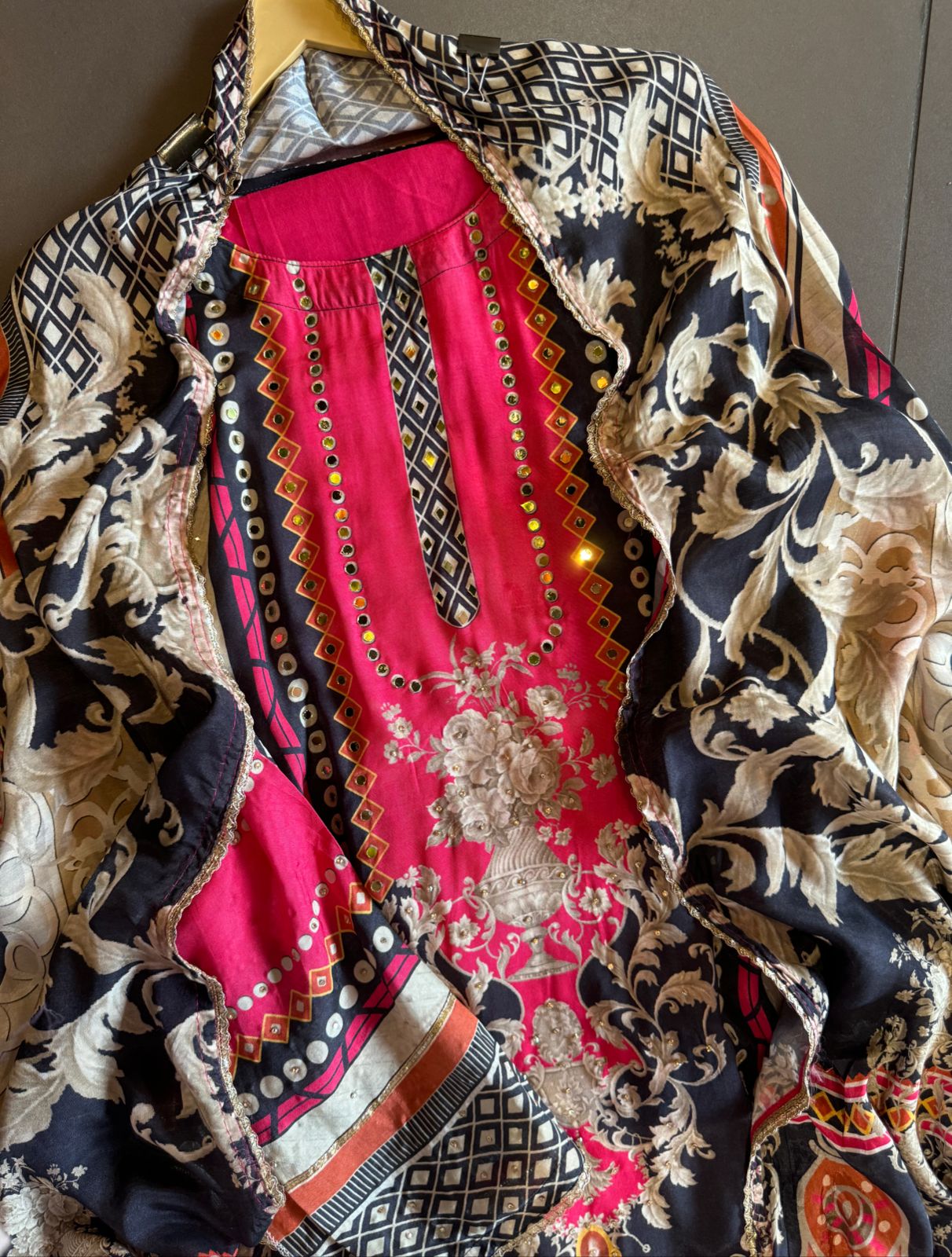 Muslin Silk digital printed Pakistani semi stitched Suit with original mirror work highlighting on the shirt front