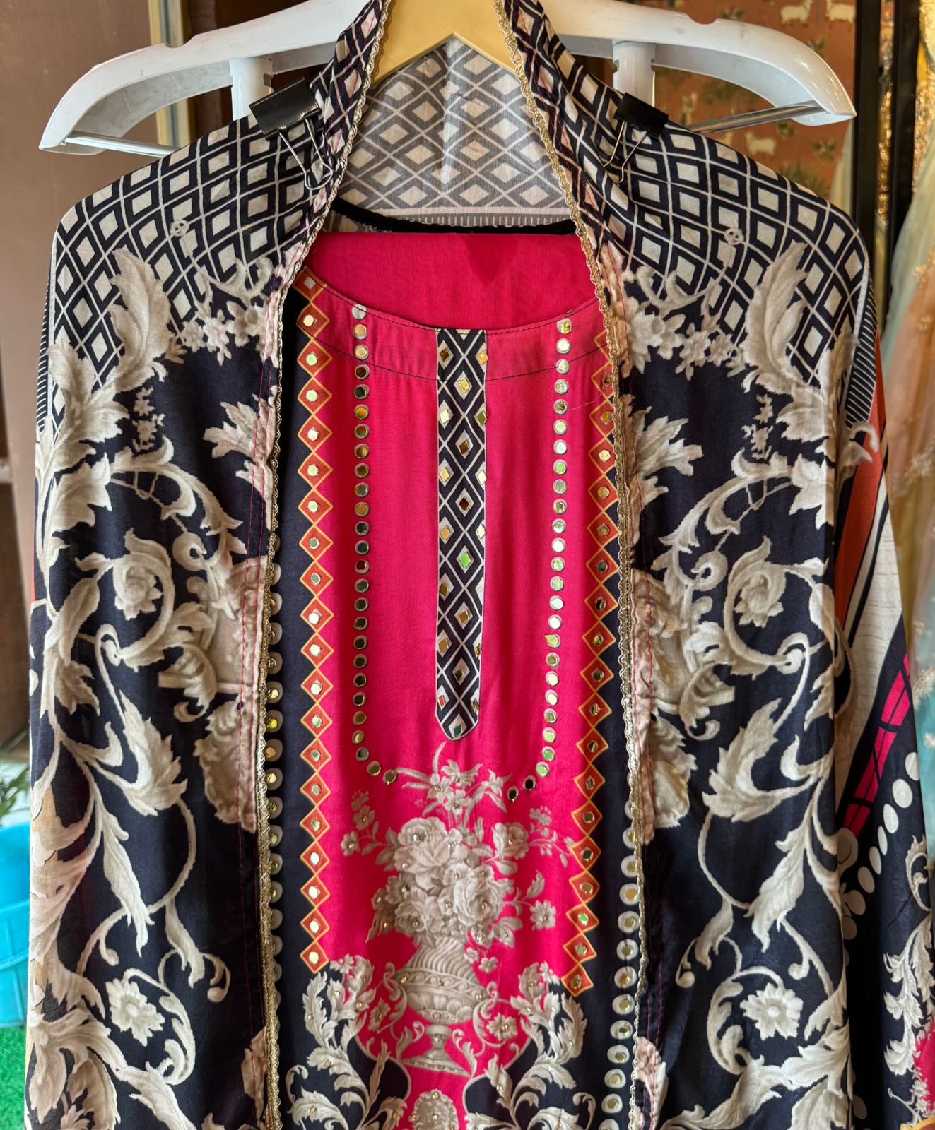 Muslin Silk digital printed Pakistani semi stitched Suit with original mirror work highlighting on the shirt front