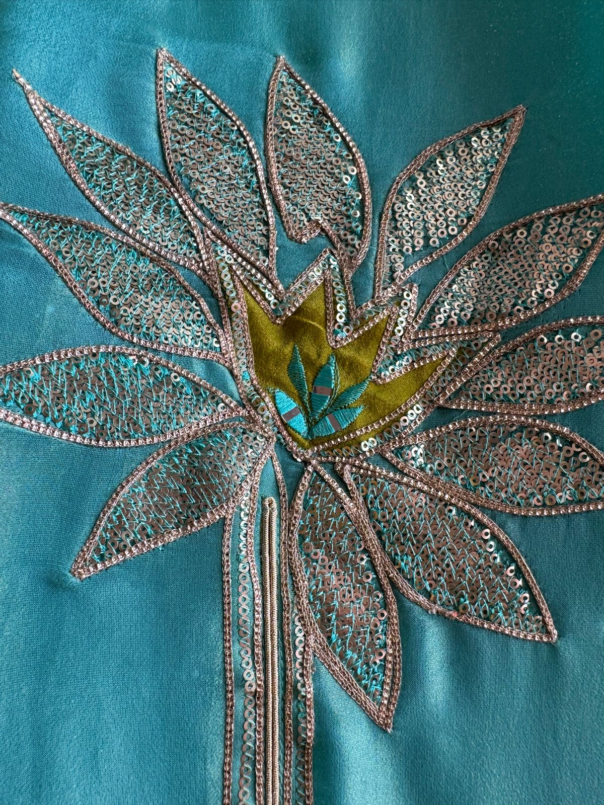 Pure Shimmer Tissue Unstitched Shirt with designer neckline with gotta Detailimgs and A flower design on the neck front with sequence and thread work done.