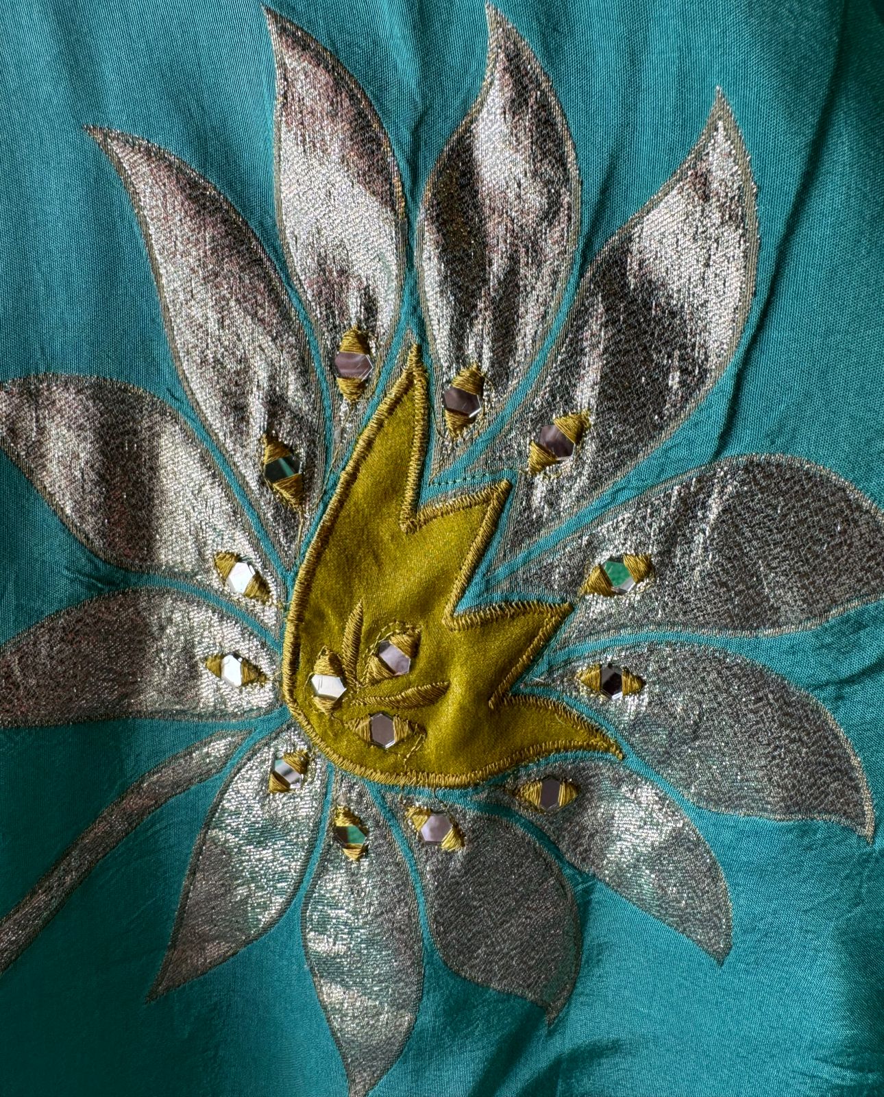 Pure Shimmer Tissue Unstitched Shirt with designer neckline with gotta Detailimgs and A flower design on the neck front with sequence and thread work done.