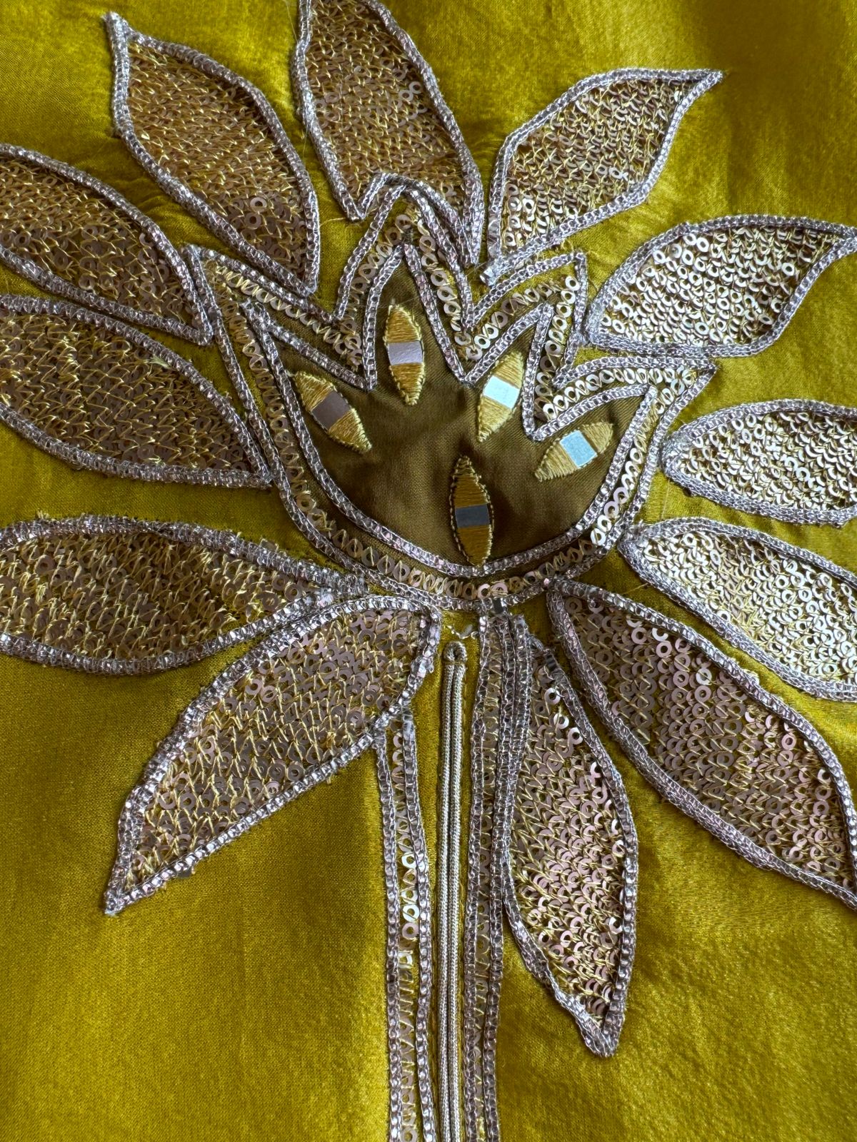 Pure Shimmer Tissue Unstitched Shirt with designer neckline with gotta Detailimgs and A flower design on the neck front with sequence and thread work done.