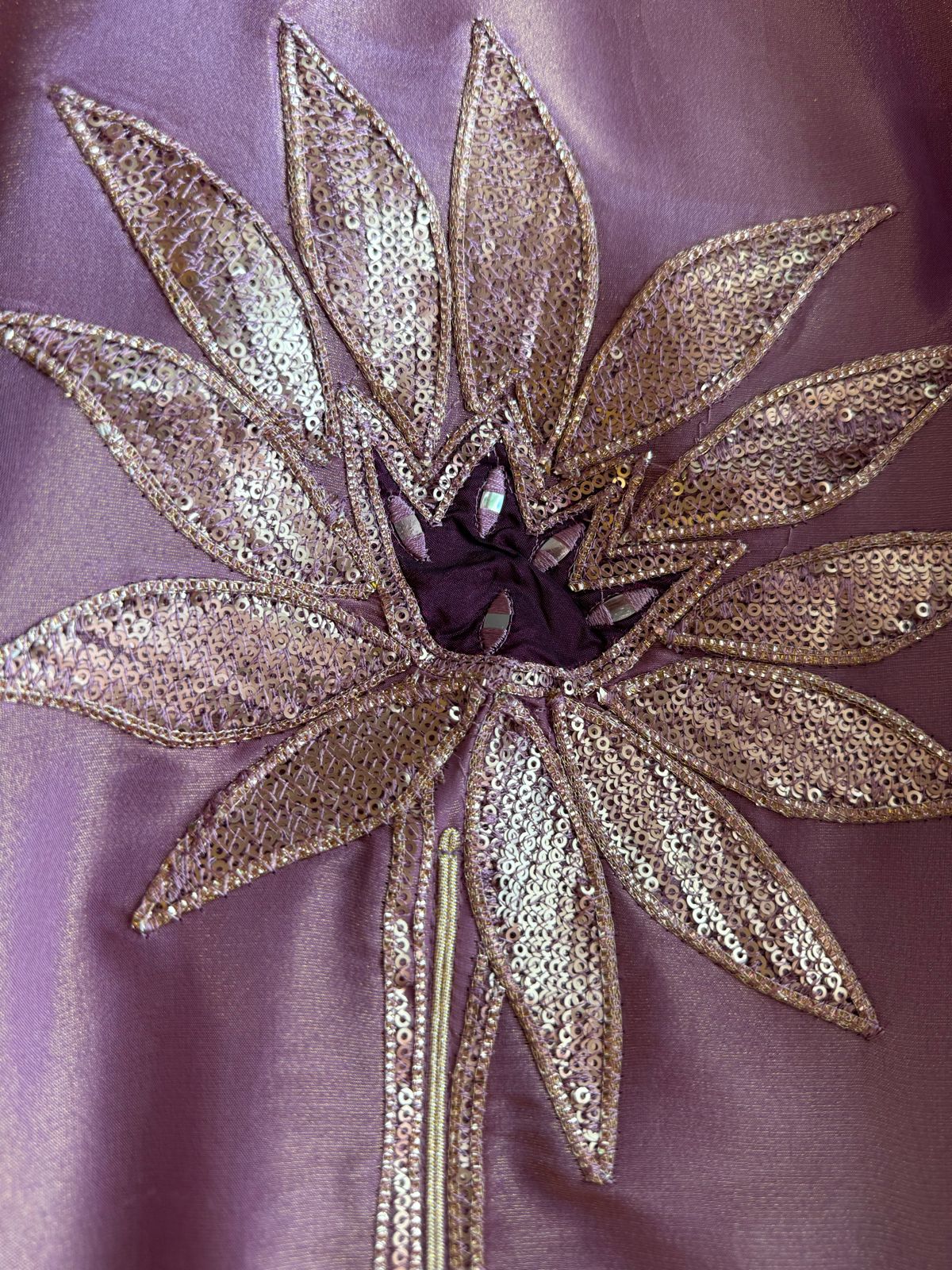 Pure Shimmer Tissue Unstitched Shirt with designer neckline with gotta Detailimgs and A flower design on the neck front with sequence and thread work done.