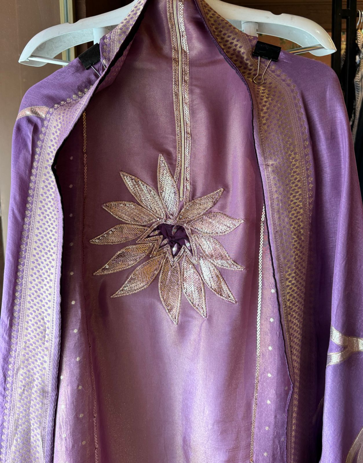 Pure Shimmer Tissue Unstitched Shirt with designer neckline with gotta Detailimgs and A flower design on the neck front with sequence and thread work done.