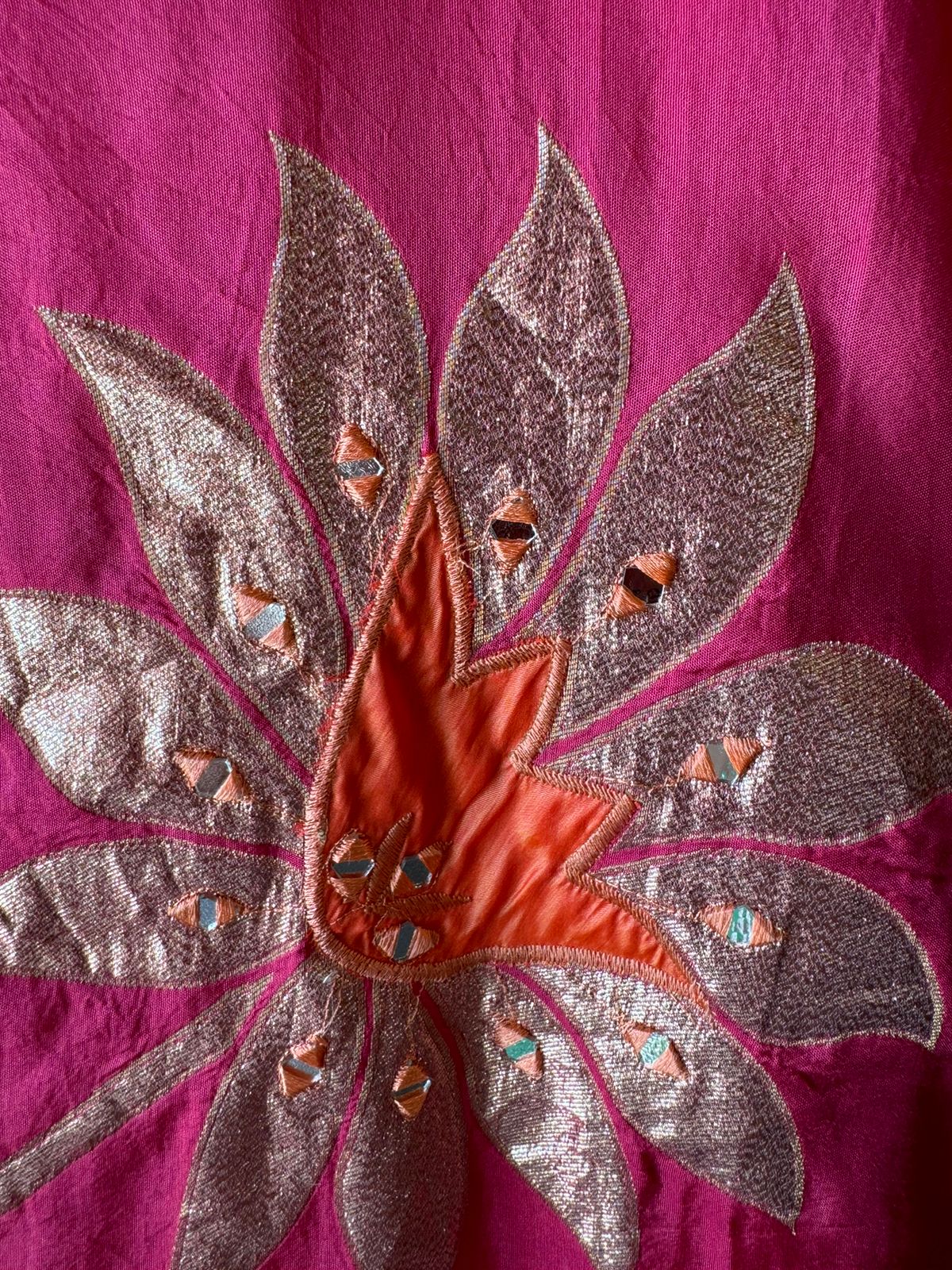 Pure Shimmer Tissue Unstitched Shirt with designer neckline with gotta Detailimgs and A flower design on the neck front with sequence and thread work done.