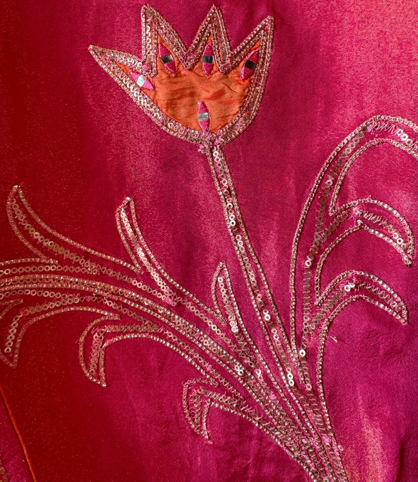 Pure Shimmer Tissue Unstitched Shirt with designer neckline with gotta Detailimgs and A flower design on the neck front with sequence and thread work done.