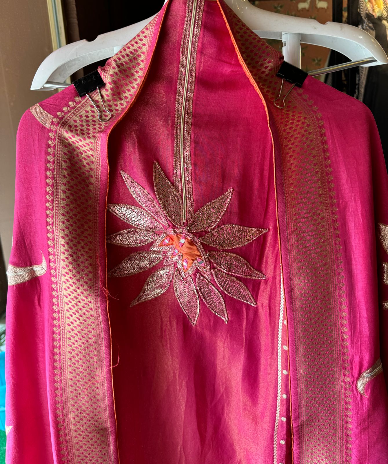 Pure Shimmer Tissue Unstitched Shirt with designer neckline with gotta Detailimgs and A flower design on the neck front with sequence and thread work done.