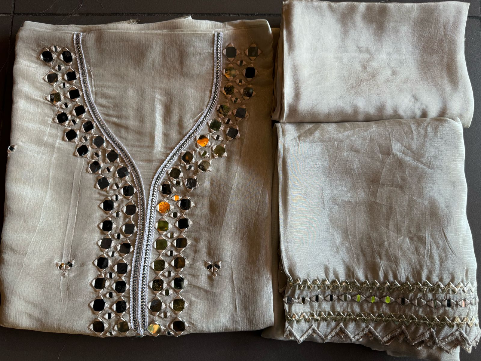 Shop our latest Mirror work tissue suits