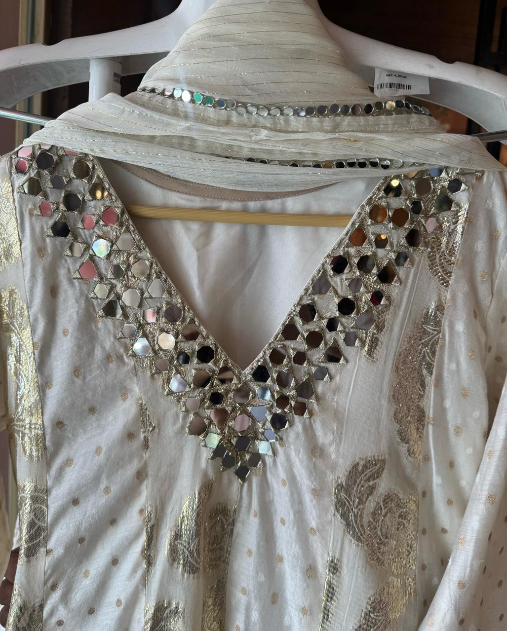 Presenting a very gorgeous stitched ivory full flared Anarkali suit